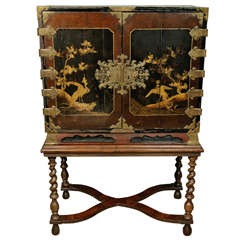 A 17th Century Japanese Lacquer Cabinet on English Stand