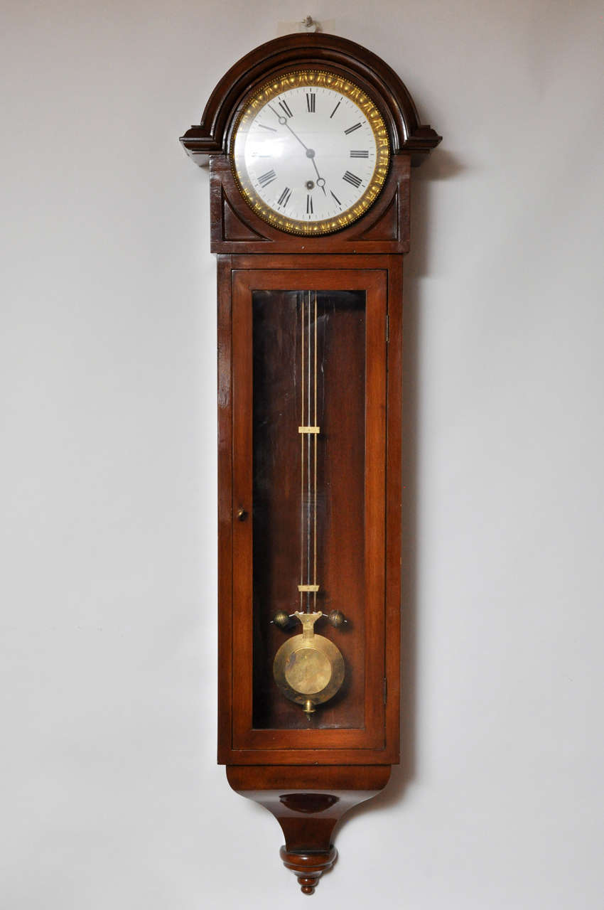A rare French jeweler's regulator once used to accurately set the time on all other jeweler's clocks and watches. Many features make this clock a rare find, an exquisite French polished mahogany case, beveled glass framed porcelain dial, encircled