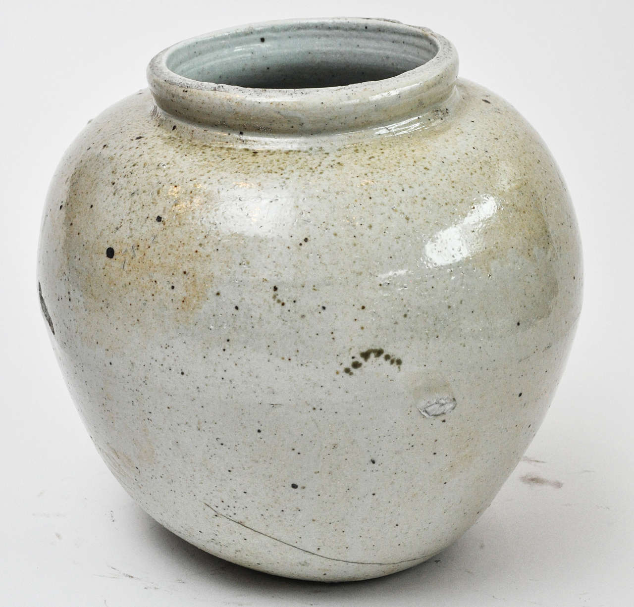 This is a folk art pot with a buff glaze from the Yi Dynasty circa 17th/18th Century.