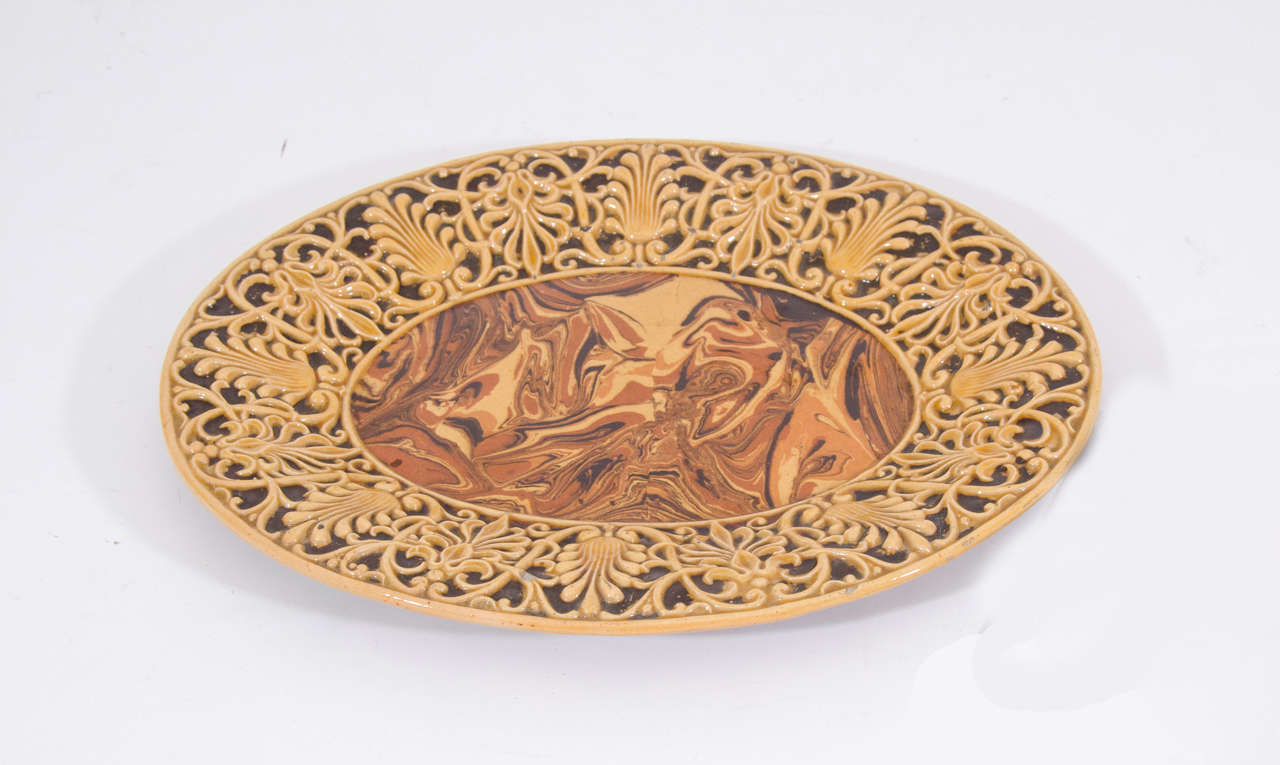 Early 20th Century Terre d'Apt Strie Marbelized Glazed Faience Platter from the South of France.

(13 x 10 inches)