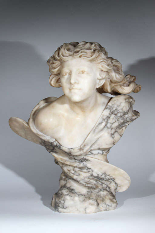 Wonderful sculpture of a beautiful woman with windswept hair and an airplane propeller embedded into the design. It's possible that it was created for exhibition celebrating aviation of the period as it would be highly unusual to include the