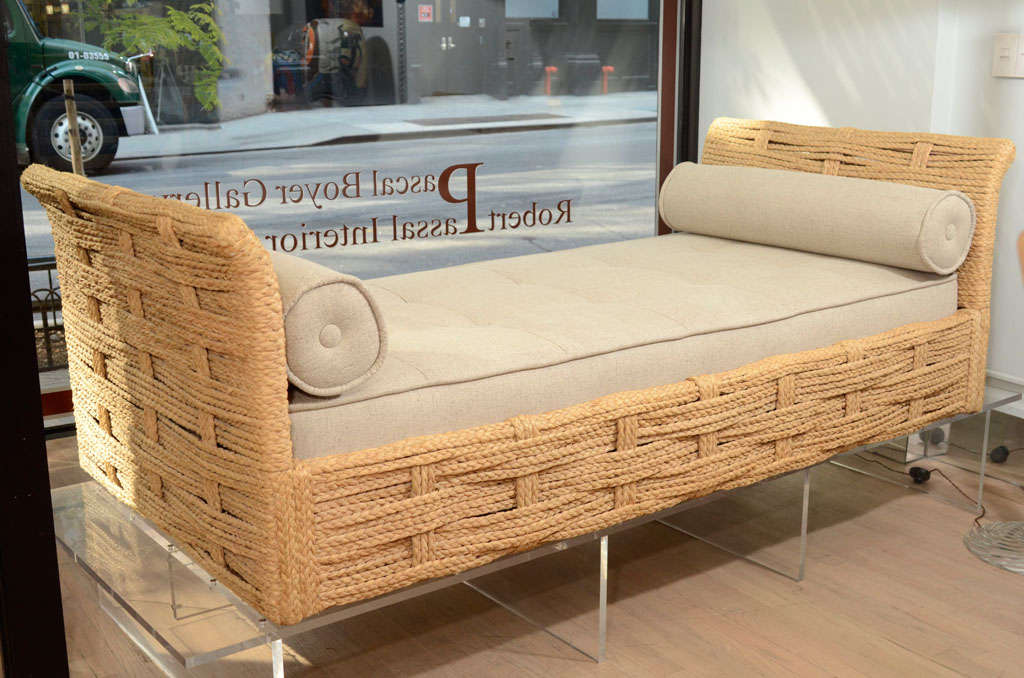 A classic rope daybed by Audoux Minet, with new bolsters and mattress to match the incredibly preserved frame. The pure and effortless aesthetic of this artist make this daybed irresistibly charming and forever chic.