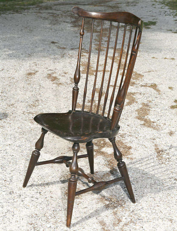 Another handsome American Windsor concept from the tireless Wallace Nutting. Don't I wish I could ever have an 18th century<br />
chair as highly developed as this one. It is labeled, stamped and <br />
numbered 310 which is the model number