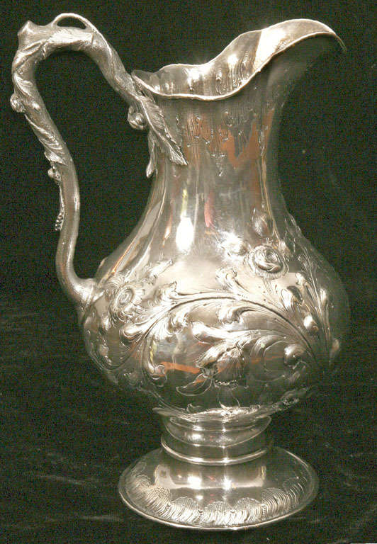 Repoussé Coin or Sterling Silver Water Pitcher Ca. 1860