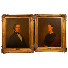 Pair of 19th C. Portraits on Linen with Carved Gilt Frames
