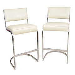 Pair of chrome frame cantilevered bar stools by Milo Baughman