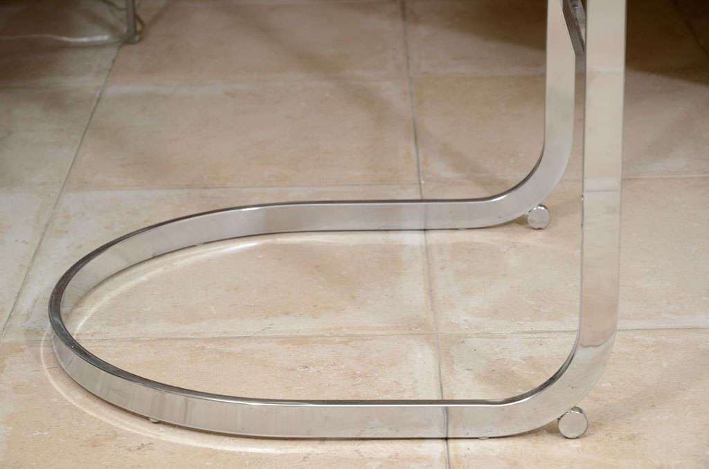 Chrome Pair of chrome frame cantilevered bar stools by Milo Baughman