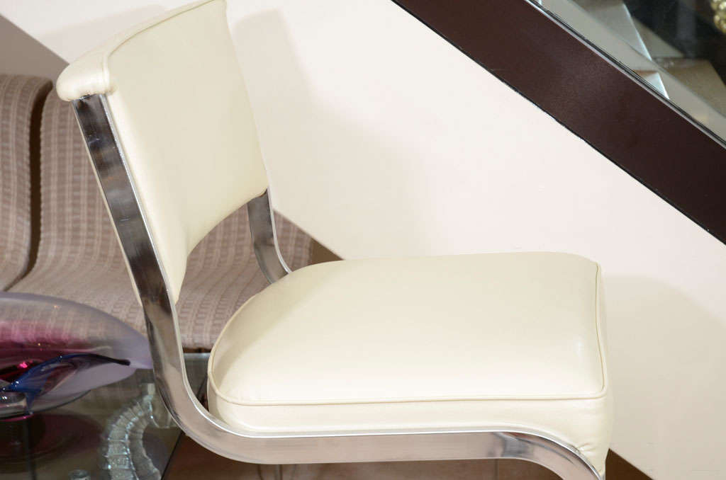 Pair of chrome frame cantilevered bar stools by Milo Baughman 2