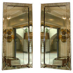 Big Pair of mirrors with éléments in Murano glass.