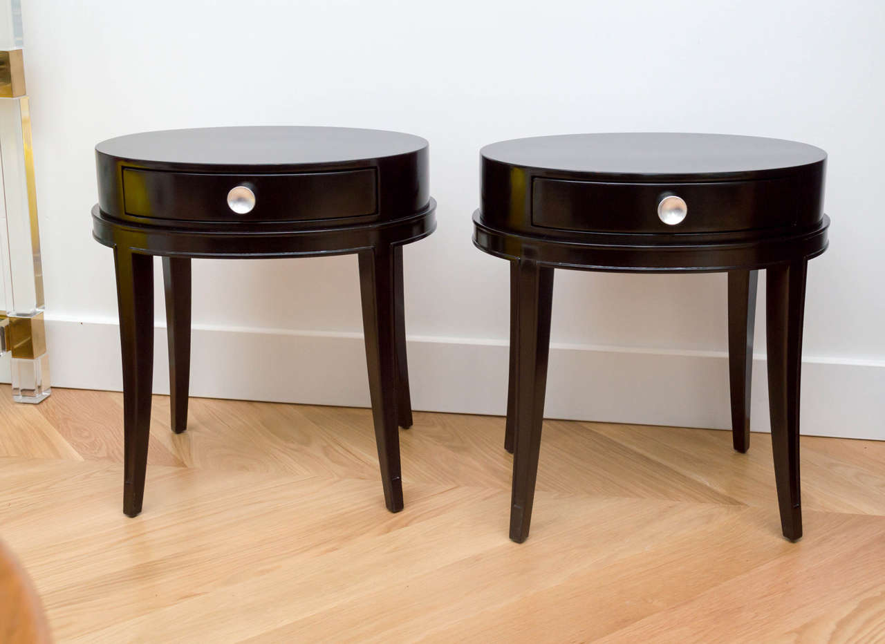 Beautiful pair of black lacquered Grosfeld House tables.
