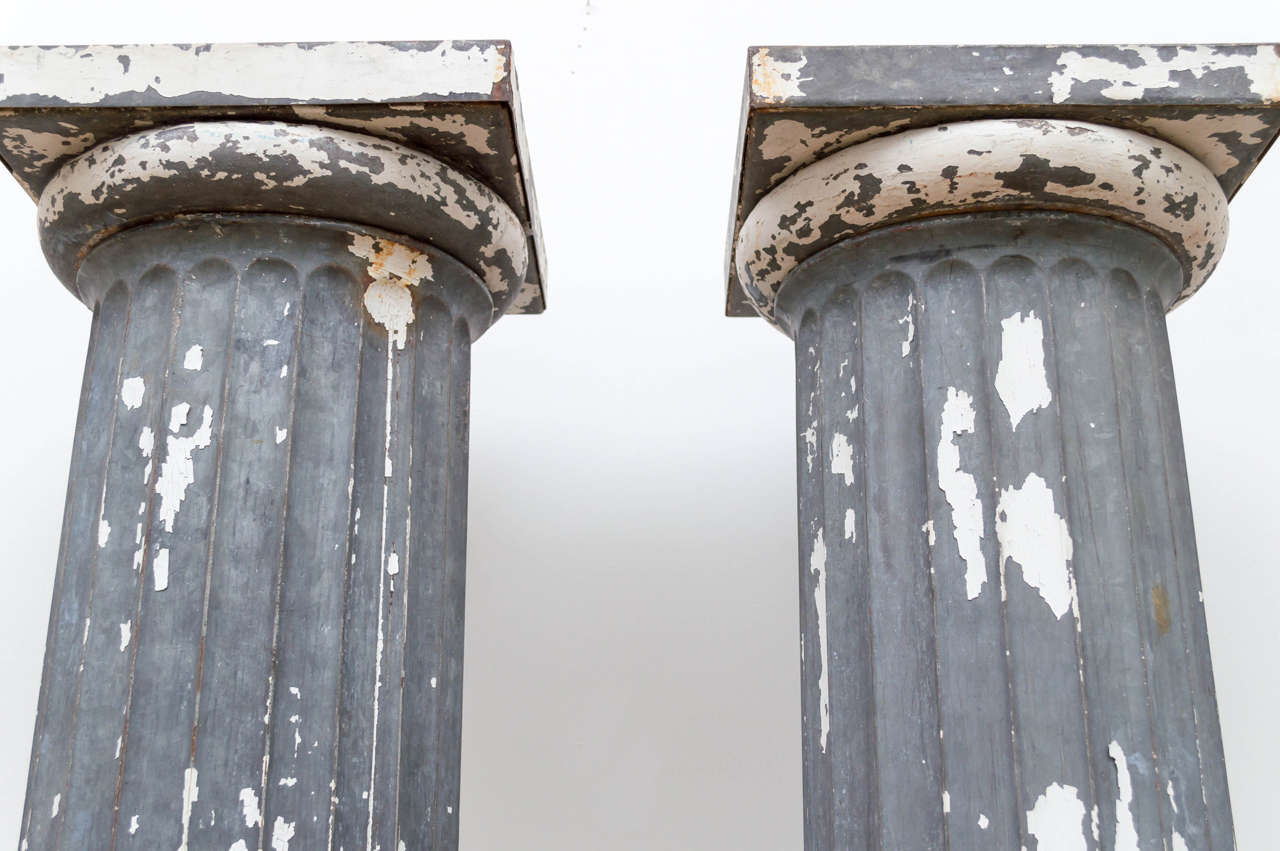 Pair of Beautifully Distressed Metal Doric Columns In Distressed Condition In San Francisco, CA