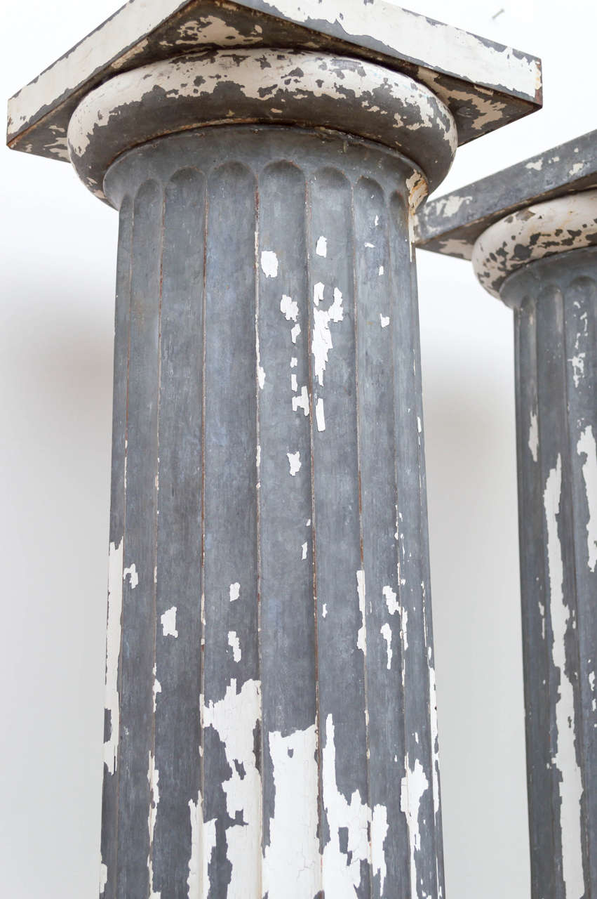 Pair of Beautifully Distressed Metal Doric Columns 1