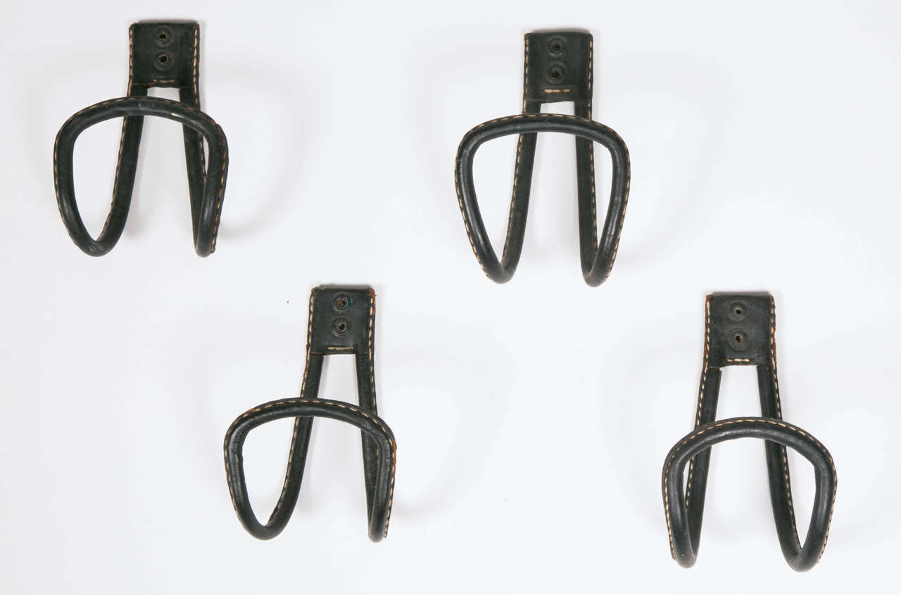 Mid-20th Century Set of Four Coat Racks by Jacques Adnet
