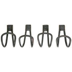 Set of Four Coat Racks by Jacques Adnet