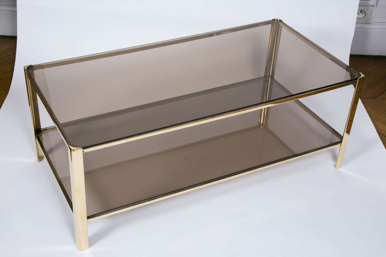 Polished bronze coffee table.
Wrote bronze and signed Malabert.