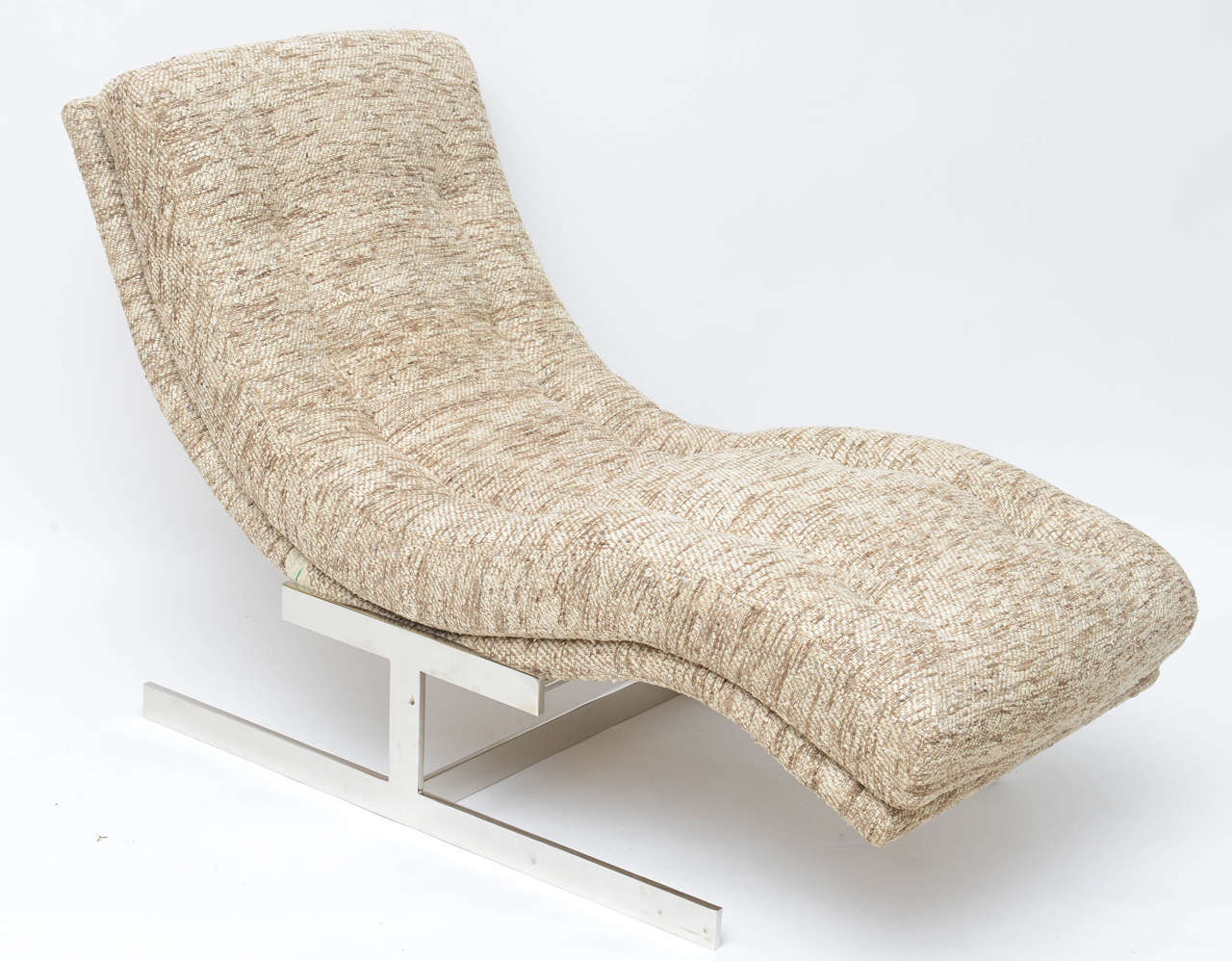 Milo Baughman's classic Wave lounge with chromed steel base. Sumptuously upholstered in thick, richly textured raw silk.