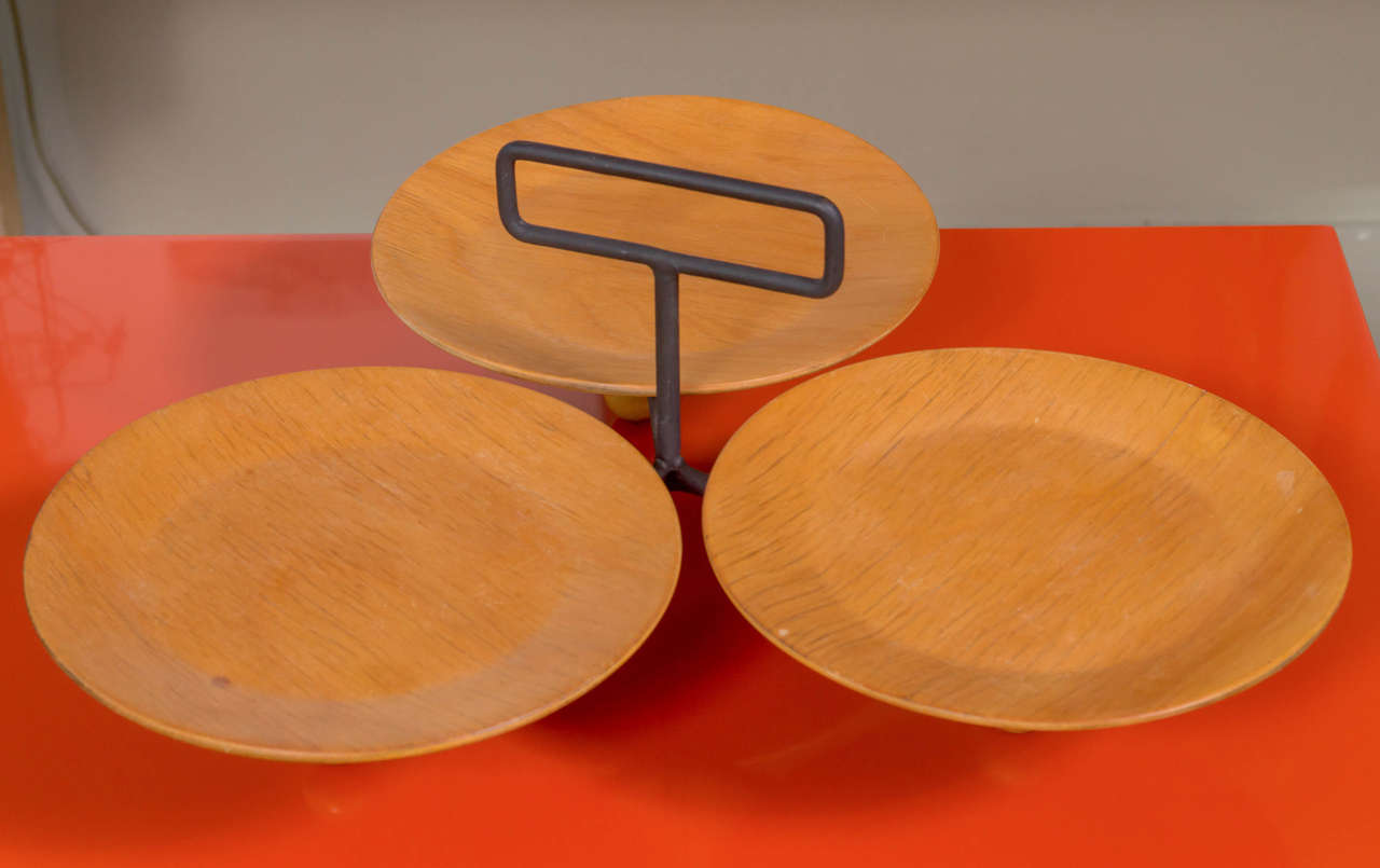 A modernist molded birch plywood and wrought iron serving tray designed by Tony Paul from the Tempo Group for Woodlin-Hall.