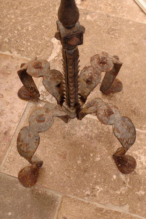 A Spanish  Cast Iron Candelabra Stand