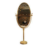 Antique An Adjustable Oval Brass Framed Mirror Stand.
