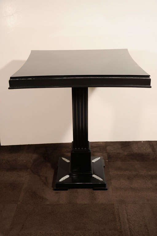 This pair of exquisite side or end tables was realized by the illustrious Mid-Century Modern designer James Mont in ebonized mahogany. Mont's clientele included Hollywood celebrities such as Bob Hope and Irving Berlin, as well as east coast mobsters