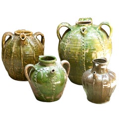 Set of Four Glazed Artisan Crafted Jars