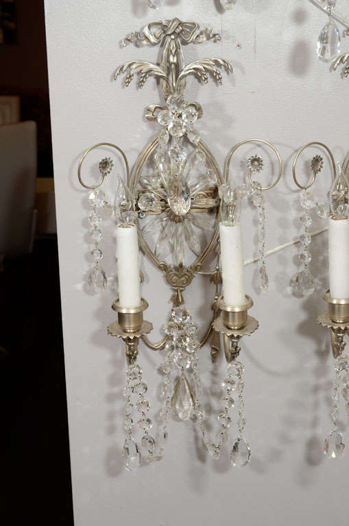 Pair of 19th century silver leaf and crystal wall sconces.