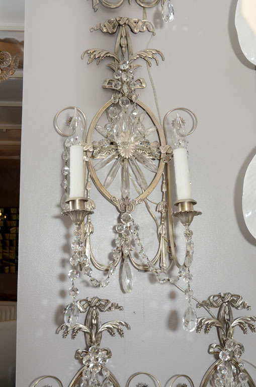 Pair of 19th century silver leaf and crystal wall sconces.
