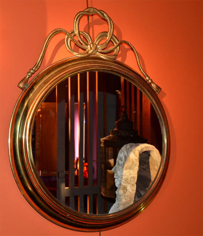 Pair of brass mirrors.