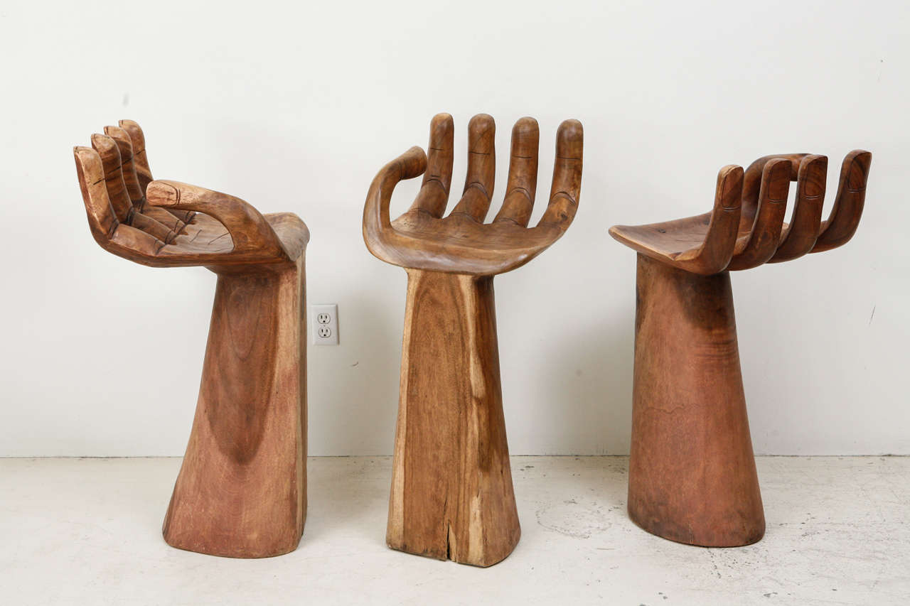 Vintage Hand Stools in the style of Pedro Friedberg.  Solid teak.