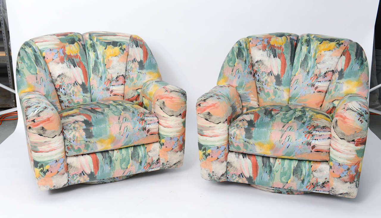 ....SOLD....In original Impressionist splash of color silk upholstery, this exceptional pair of Directional Lounge Chairs on swivel bases has it all. Large scale comfort, smooth curved outer body and overstuffed channeled front. Glorious original