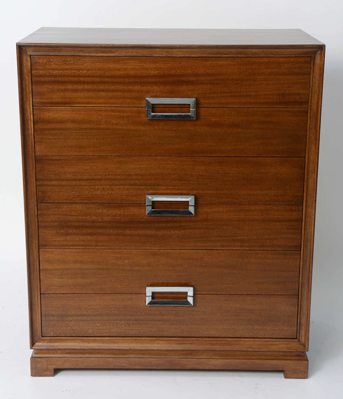 ..REDUCED FROM $3,000 FOR SATURDAY SALE..A fine 1940s Paul Frankl style mahogany six drawer gentleman's chest of drawers providing great storage by the noted Red Lion Table Co. of Red Lion, PA. Polished nickel handles and strong, yet simple lines