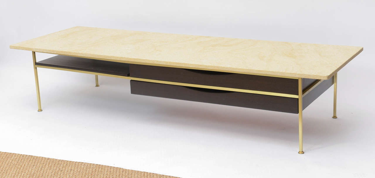 Coffee table designed by Paul McCobb for Calvin Furniture. Brass frame with travertine top.