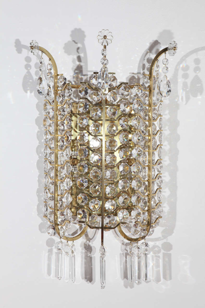 Midcentury crystal sconces. Three pairs available.