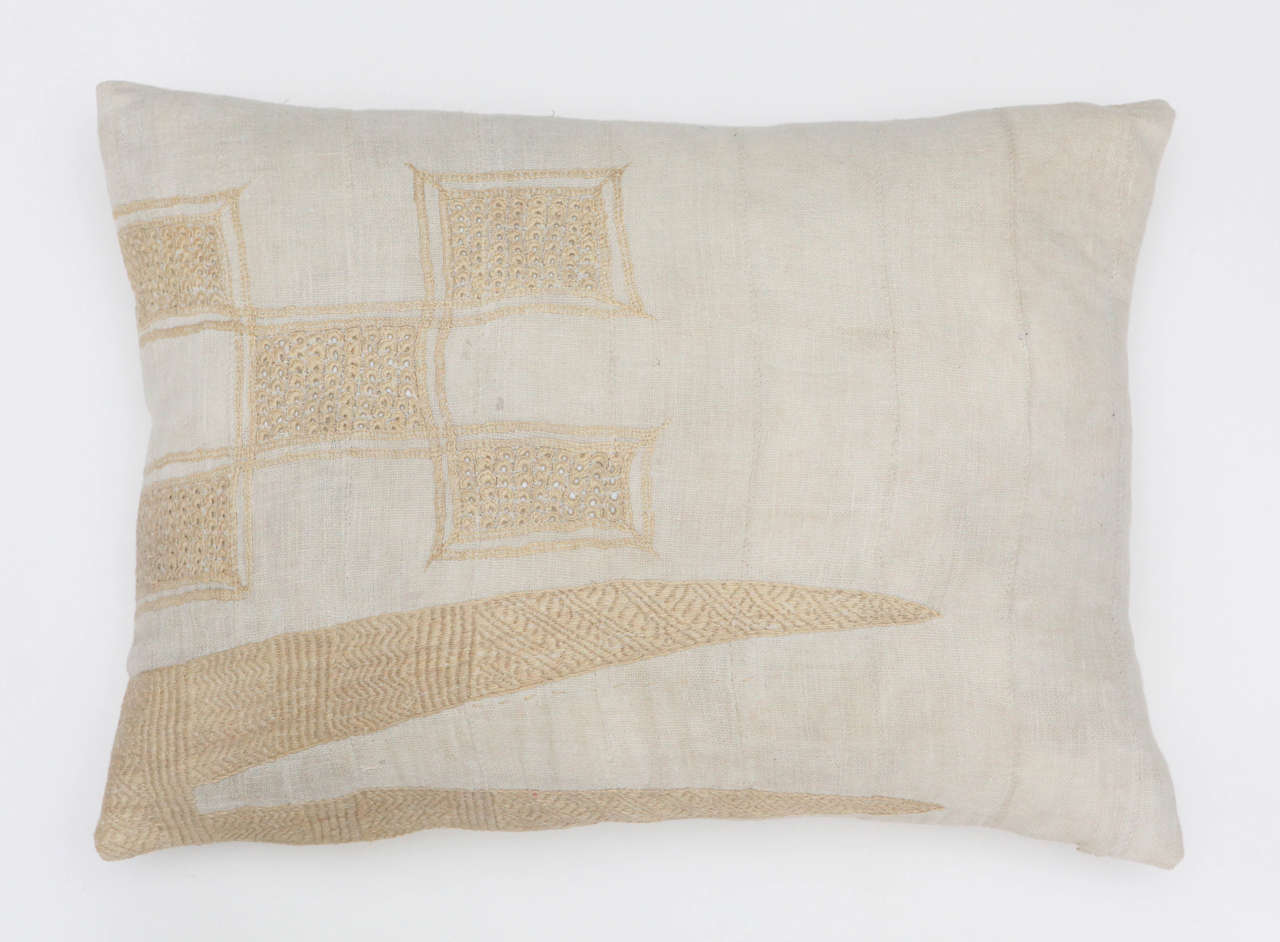 Throw pillow made from the traditional African robe. Taupe linen background with tan embroidery, natural linen back. Hidden zipper enclosure. More of this style in neutral colors available. Assorted sizes.