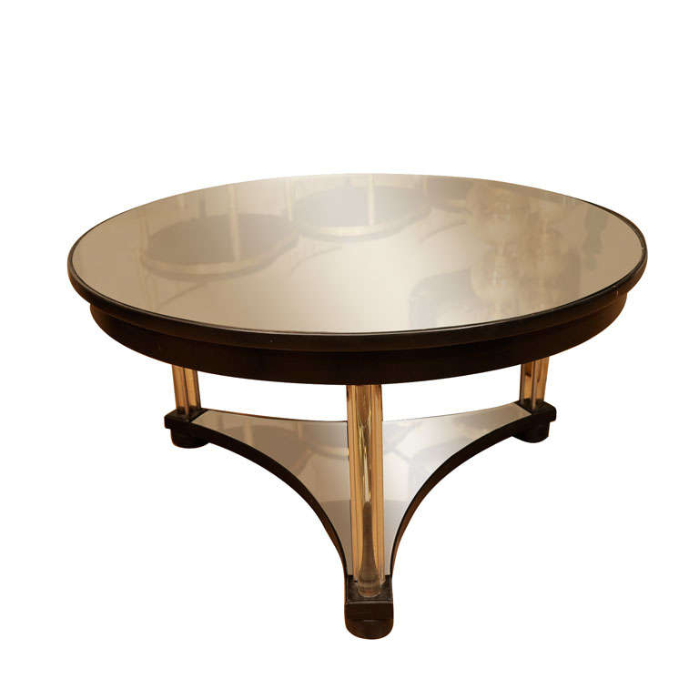 Circular mirrored cocktail table by Grosfeld House