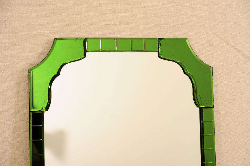 Art Deco Rectangular Mirror with Central Mirrored Glass Plate Bordered by a Green Glass Frame with Canted Curved Corners.  England, c. 1930<br />
<br />
Note: This mirror can be hung vertically (as shown) or horizontally. <br />
<br />
30 inches