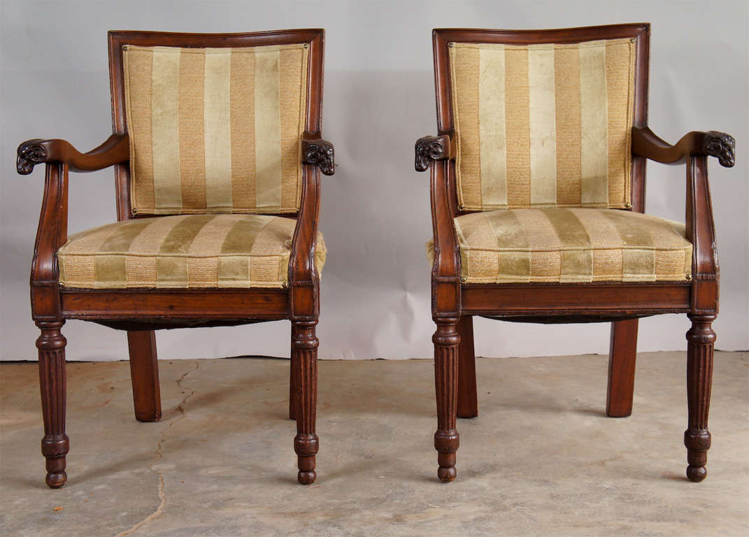 Fantastic rare pair of Rams Head Armchairs. Beautifully proportioned armchairs with Rams Head detail and fluted legs. Age appropriate light wear.