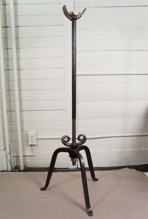 Hand forged iron stands used by glass blowers to support the blowing tube in the furnace. Large hand made wing nut allows user to adjust height. Priced per item. Call 518-821-1599 for details.