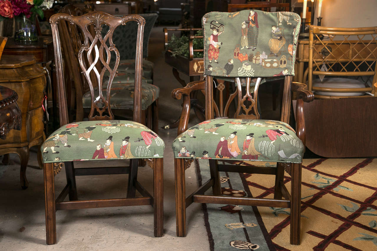 Set of eight Chippendale dining chairs by Baker Furniture Company. This fine solid mahogany Chippendale style dining room chairs,, have wonderful carved straight legs supported by four stretchers leading to a finely pierced splat back. The armchairs