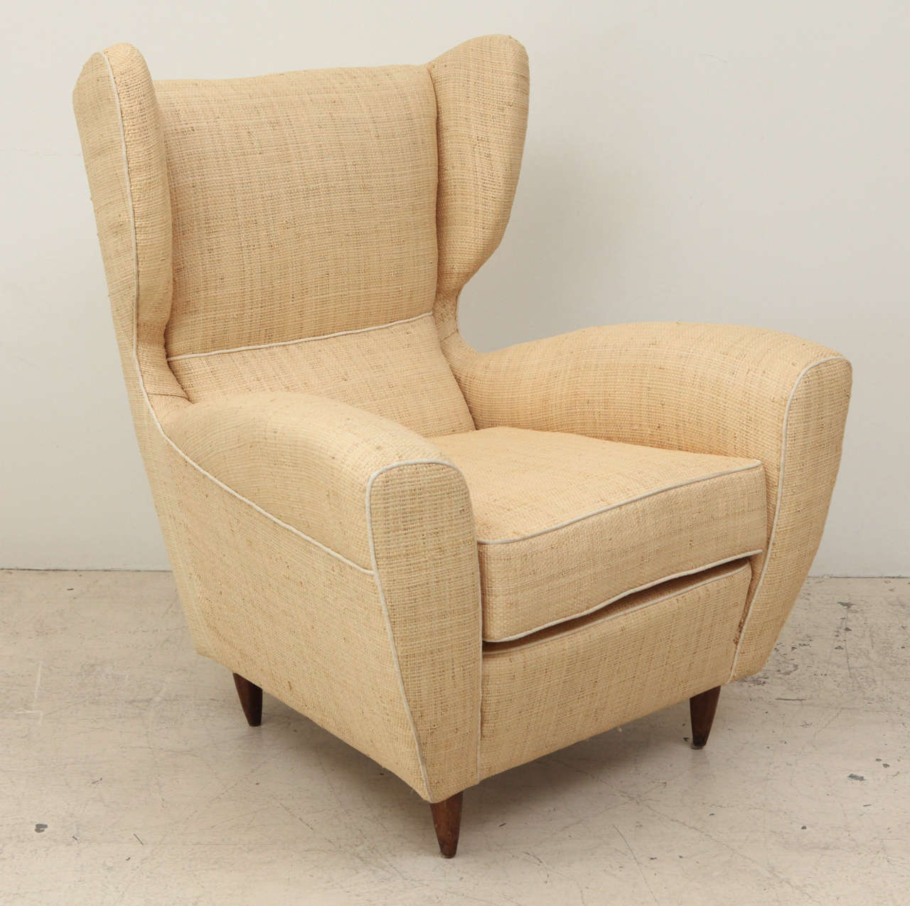 Pair of Raffia Upholstered Midcentury Italian Wing Chairs In Excellent Condition In Los Angeles, CA