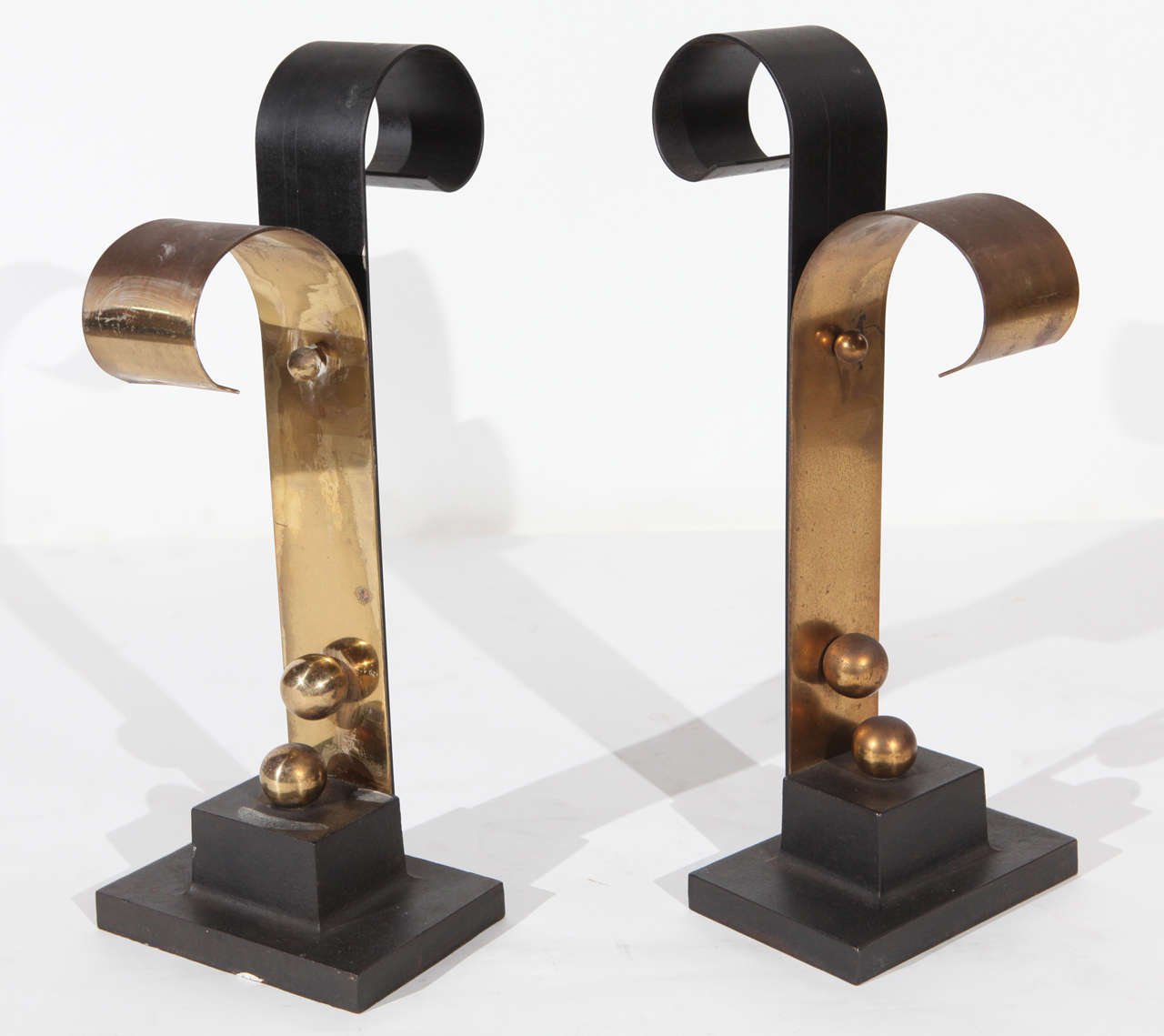 An amazing pair of vintage Richard Neutra andirons from a famous house near UCLA located at 234 Hilgard Avenue in Westwood. Made of brass and wrought iron.