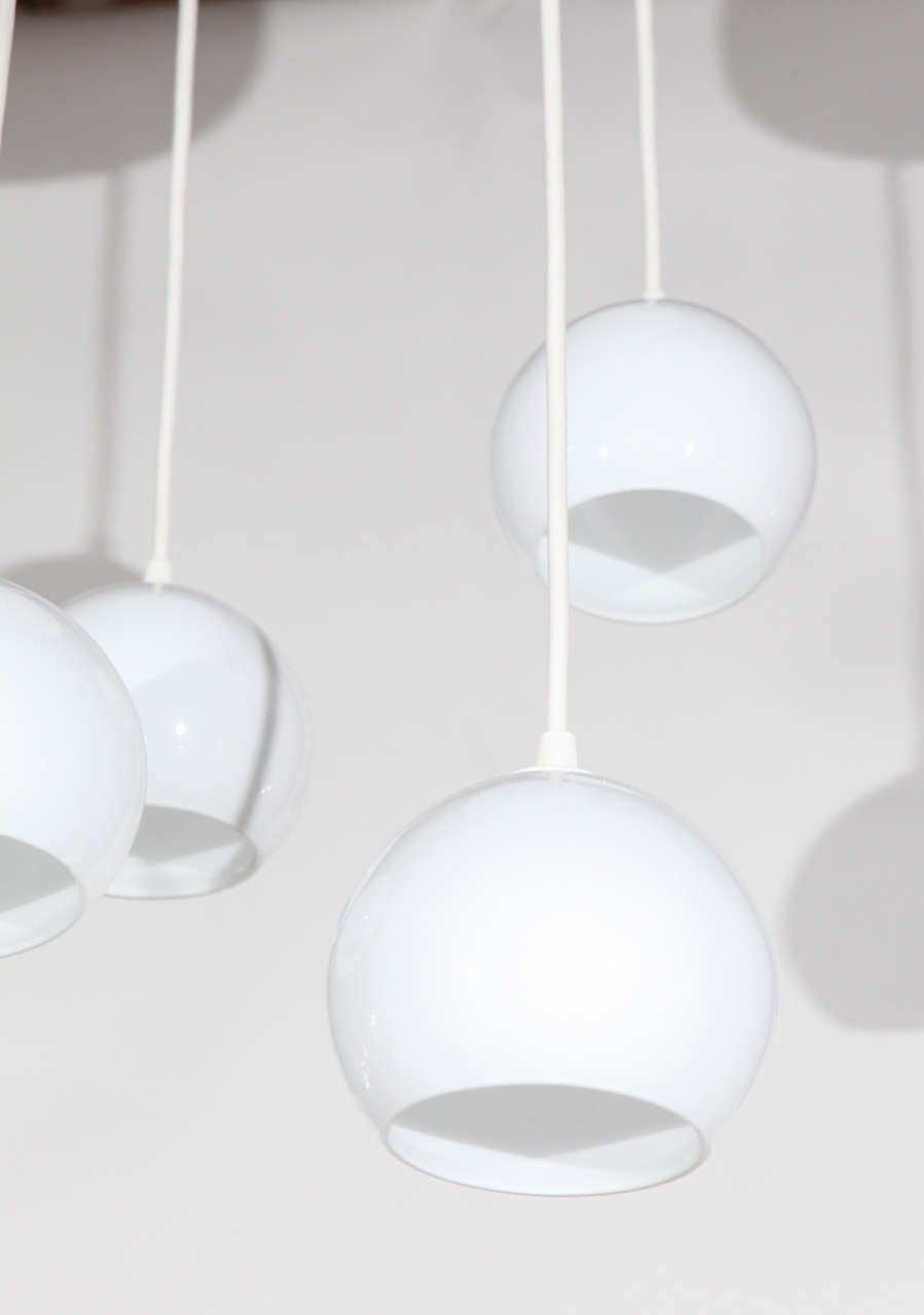 Pair of Midcentury, FourLight Pendants For Sale at 1stDibs