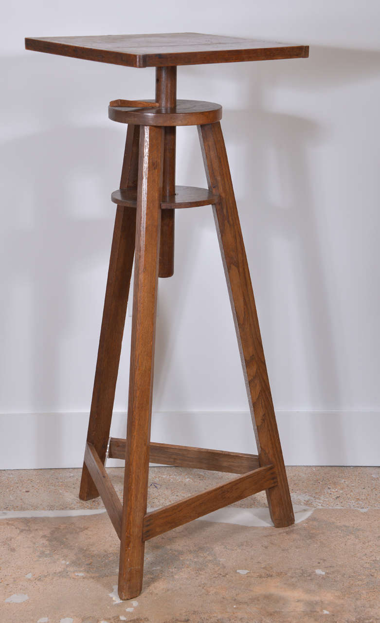 Late 19th century sculptor's stand in oak with adjustable revolving top.
