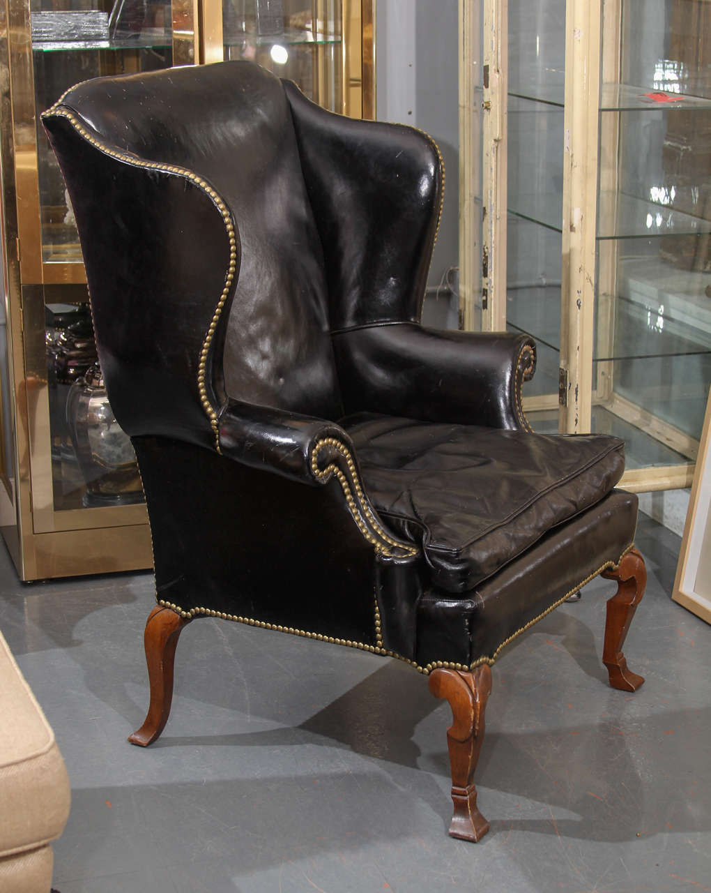Oversized, great lines. Leather with nailhead trim.