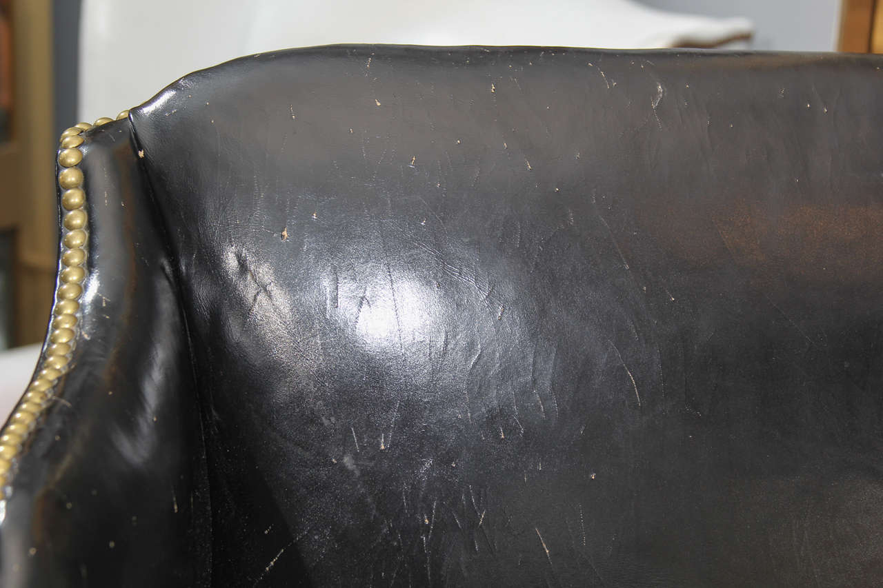 black leather wing back chair