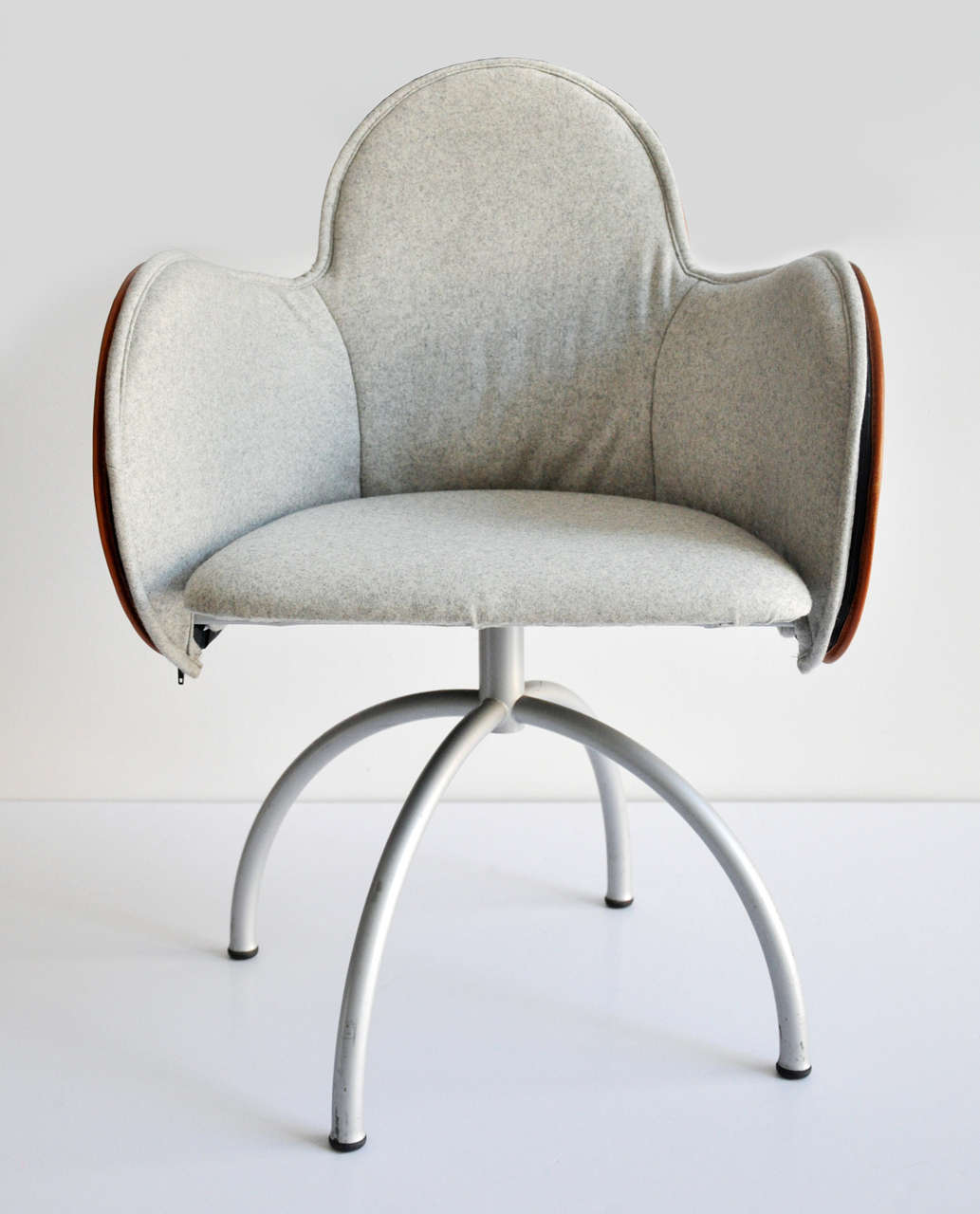 A beautiful example of Magistretti's Incisa swivel armchair, designed in 1992 for De Padova. The recipient of many awards including the Compasso d'Oro in 1967 and 1979 and the Gold Medal of the SIAD (Society of Industrial Artists & Designers) in