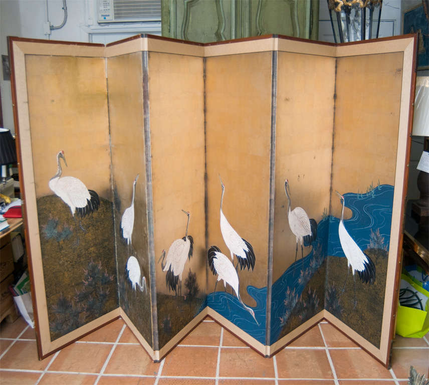 Six panel Japanese Screen depicting red horn cranes feeding on a river bank.

Each panel is 24.4 inches wide