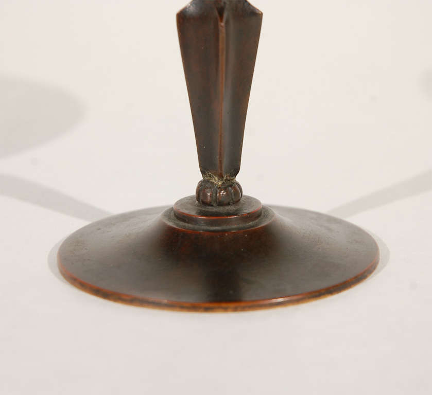 An elegant bronze compote by Just Andersen with stylized leaves holding up the bowl. Stamped on the underside with Andersen's maker's mark and 