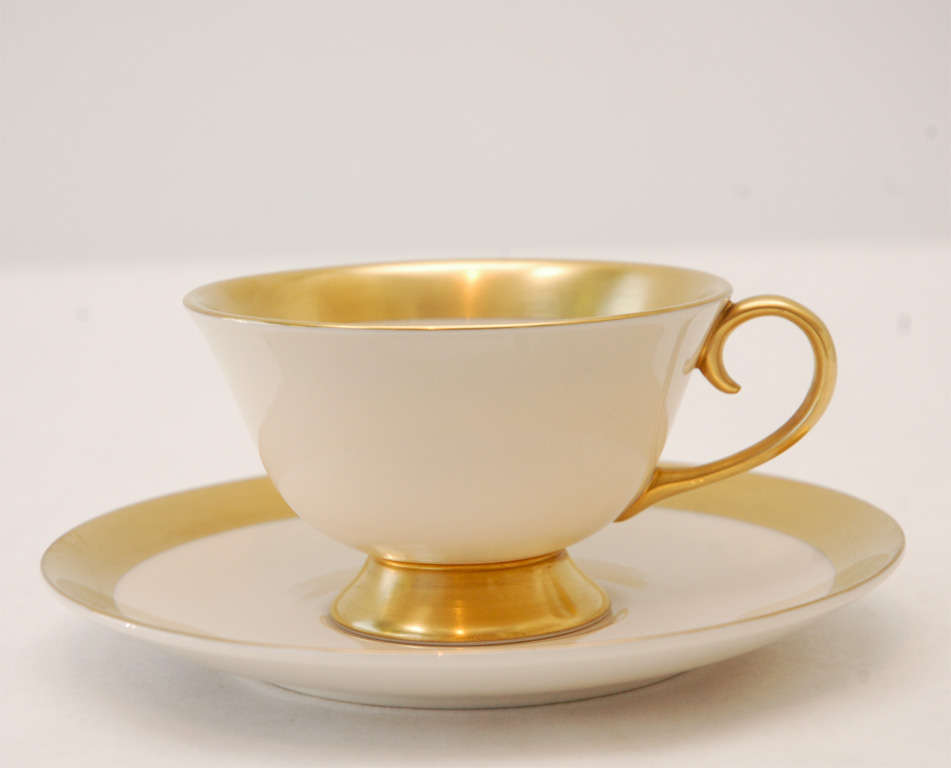 An elegant gold rim on cream base, the 