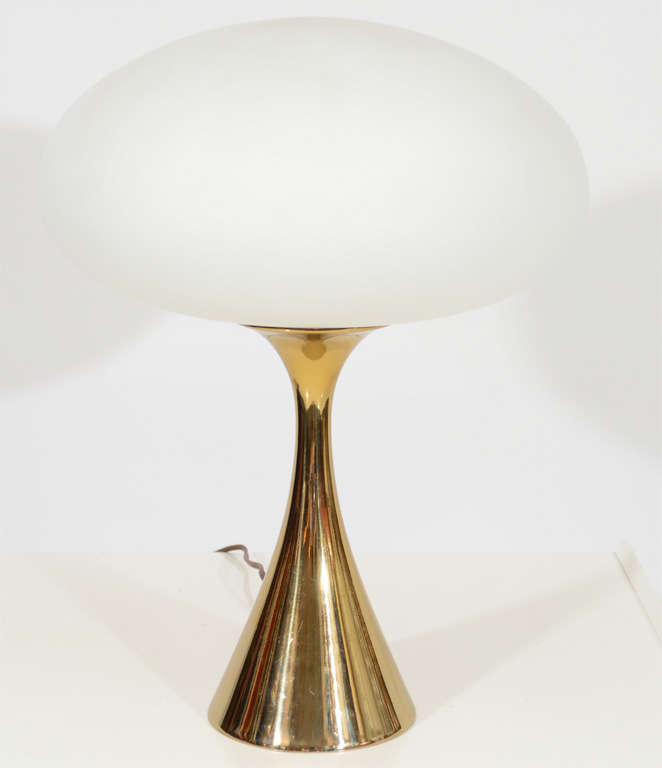 Remarkable and stylish pair of Laurel lamps. The lamps have the Classic frosted Italian art glass lampshades set on gracefully formed brass bases. The brass has a brilliant shine. Designed by Bill Curry. Chic! Please contact for location.